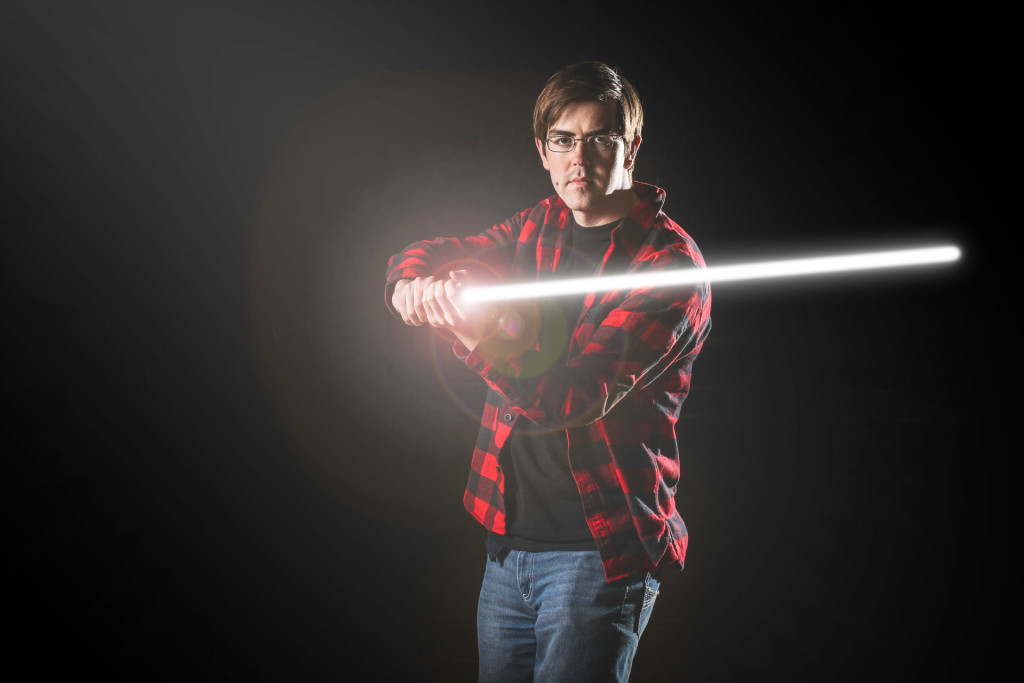 The final photo showing behind the scenes of making a lightsaber portrait picture 