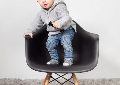 Orangeville family portrait photography by Frank Myrland of a child in a studio setting