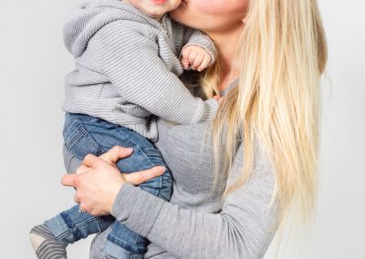 Orangeville family portrait photography by Frank Myrland of a mother and child in a studio setting
